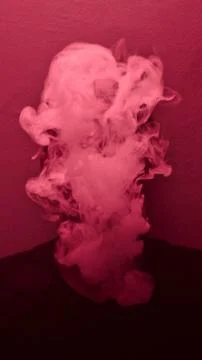 A portrait of a guy vaping. 库存照片