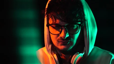 Portrait of Hacker or Programmer in Front of Computer Screen in Dark Room Stock Footage 301846195