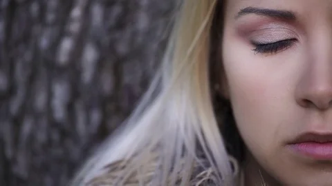 Portrait of half face of beautiful blond woman opens the eye Stock-Footage 74721784