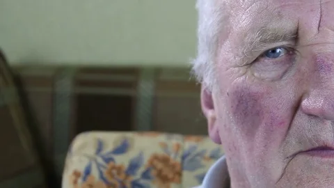 Portrait half face of an old man. Stockbeeldmateriaal 73584671