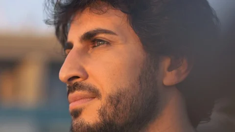 Portrait of Handsome attractive eastern man with beard at sunset, close up view Stock Footage 109458844