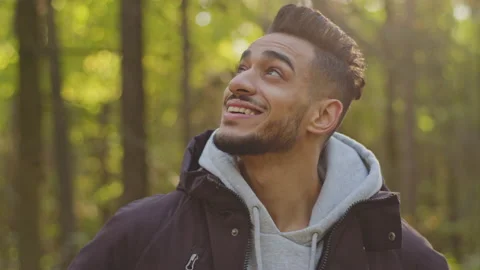 Portrait handsome bearded hispanic guy travel video blogger in great nature Stock Footage 165847630