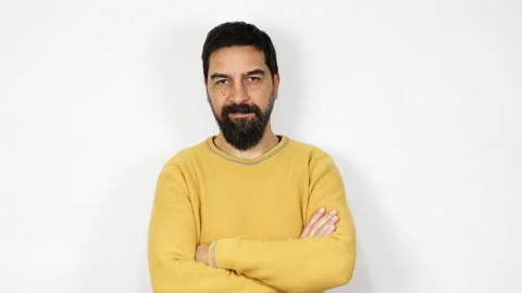 Portrait of handsome bearded man looking at camera isolated on white background. Stock Footage 165806692