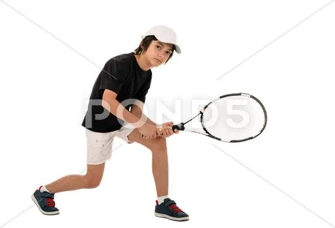 Portrait of a handsome boy with a tennis racket isolated on white background Stock Photos