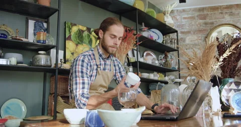 Portrait of handsome confident hardworking bearded man which sitting at computer Stock Footage 143968102