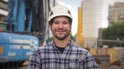 Portrait of handsome constructor worker man. Engineer builder look at camera. 動画素材 271222643