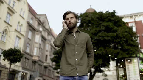 Portrait handsome man having phone talk outdoor. Business man talking on Stock Footage 146396356