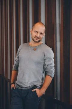 Portrait handsome man looking at the camera. Indoors Stock Photos