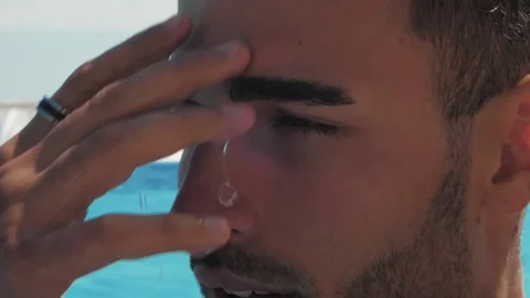 Portrait of a handsome man in the pool, Close up Stock Footage 142757980