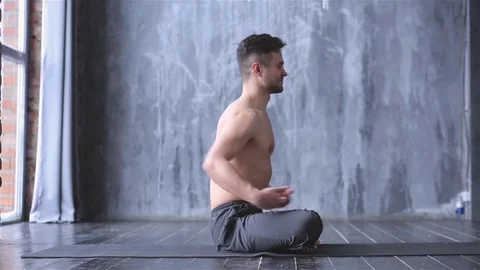 Portrait of a handsome man practicing meditation and yoga Stock Footage 71239666