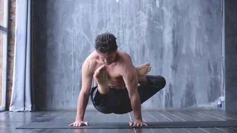 Portrait of a handsome man practicing meditation and yoga Stock Footage 71240018