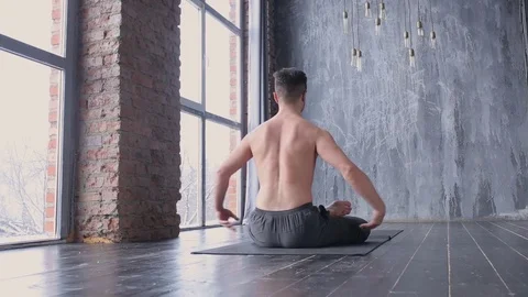 Portrait of a handsome man practicing meditation and yoga Stock Footage 71241000