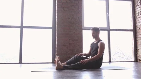 Portrait of a handsome man practicing meditation and yoga Stock Footage 71241861
