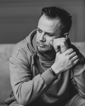 Portrait of handsome Posing In Studio, greyscale Image Stock Photos