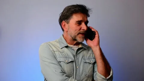Portrait handsome senior man having phone talk indoor. Stock Footage 148289727