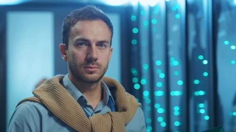 Portrait of handsome server specialist using laptop computer coworking in team Stock Photos