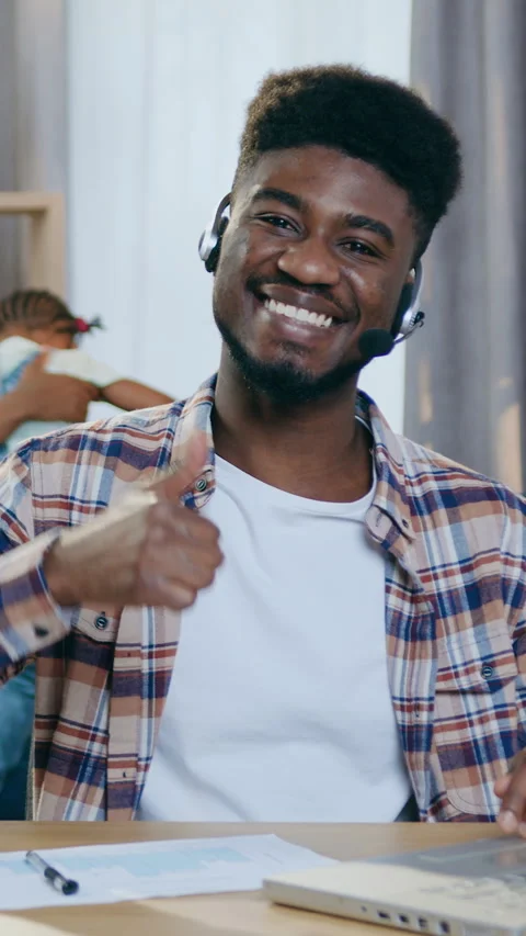 Portrait of handsome smiling man satisfied young bearded African American boy in Stock Footage 331137658