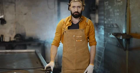 Portrait of a handsome welder Stock Footage 147294919