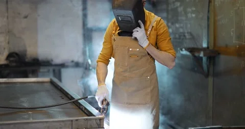 Portrait of a handsome welder Stock Footage 147295145