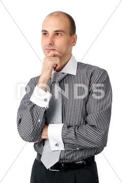 Portrait of handsome young business man looking away Stock Photos