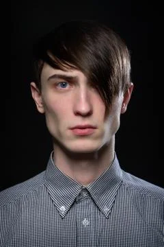 Portrait of a handsome young guy Stock Photos