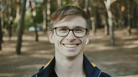 Portrait of a handsome young man looking at the camera. Stock Footage 155133873
