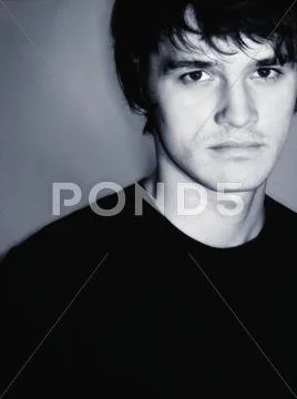 Portrait of an handsome young man Stock Photos