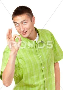 Portrait of a handsome young man showing a sign of ok, a symbol. isolate is n Stock Photos