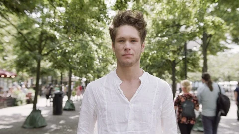 Portrait of a handsome young man on a summer trip in Stockholm City. Video stock 115922053