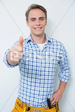 Portrait of a handyman gesturing thumbs up Stock Photos