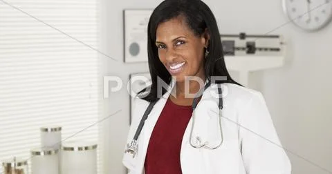 Portrait Of Happy Black Doctor Smiling At Camera