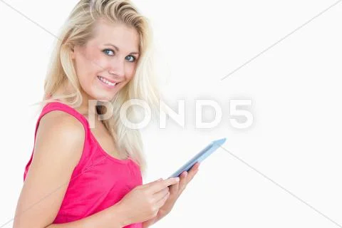 Portrait of happy casual woman with digital tablet Stock Photos
