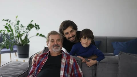 Portrait of happy caucasian three generation men smiling to the camera at home Stock Footage 201475166
