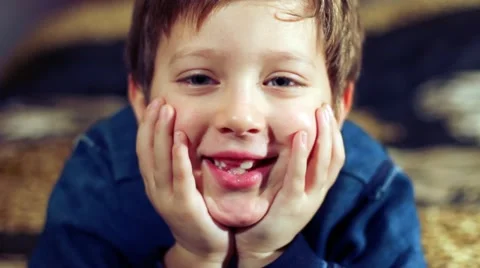 Portrait of a happy child smiling , missing one tooth Stock Footage 20672210