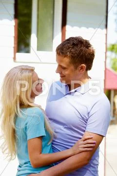 Portrait of happy couple looking at each other in the countryside Stock Photos