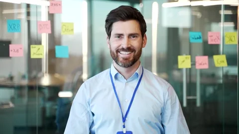 Portrait of a happy developer standing in a business office. Stock Footage 283208658