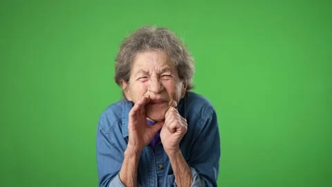 Portrait of happy elderly senior old woman with wrinkled skin and grey hair Stock Footage 238007750