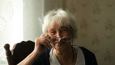 Portrait Of Happy Elderly Woman Smiling Stock Footage