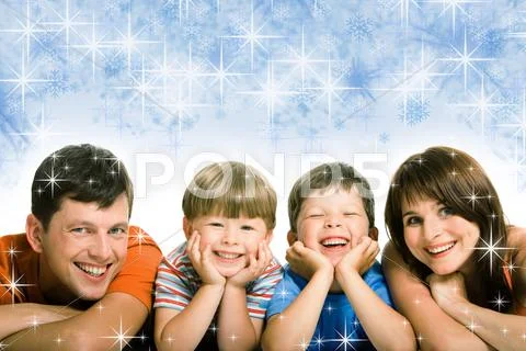 Portrait of happy family members looking at camera with laugh Stock Photos