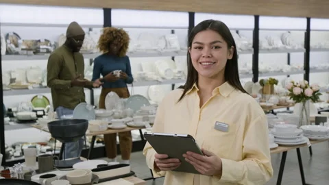 Portrait of Happy Female Tableware Store Manager with Tablet in Showroom Stock Footage 321771392