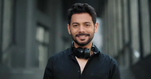 Portrait of a happy guy looking at camera and smiling. Stock Footage 244512131