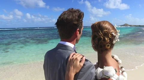 Portrait of happy just-married couple at the beach Stock-Footage 59185939