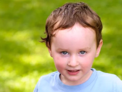 Portrait of a happy liitle boy close-up Stock Photos