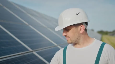 Portrait of happy male engineer in protective helmet looking to camera. Handsome Stock Footage 158819826