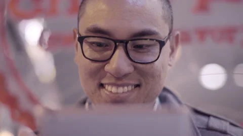 Portrait Of Happy Man Using A Tablet At Night Outside Of Cafe (4K) Stock-Footage 52629638