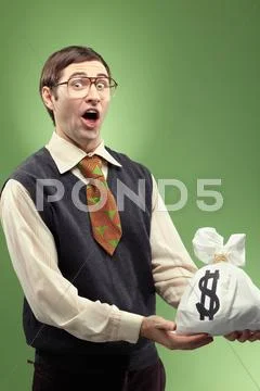 Portrait of happy nerd holding suck of money Stock Photos