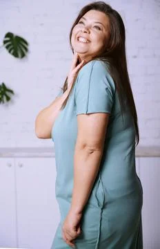 Portrait of the happy plus size model Stock Photos