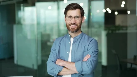 Portrait happy positive friendly bearded businessman worker looking at camera at Stock Footage 234148280