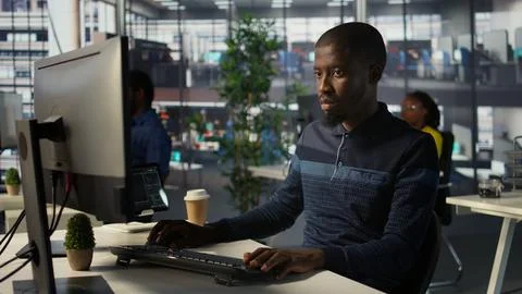 Portrait of happy programmer working with machine learning Stock Photos