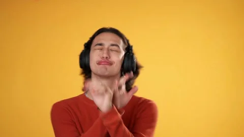 Portrait of happy smiling dancing Hispanic Latino gender fluid non-binary man Stock Footage 220720432